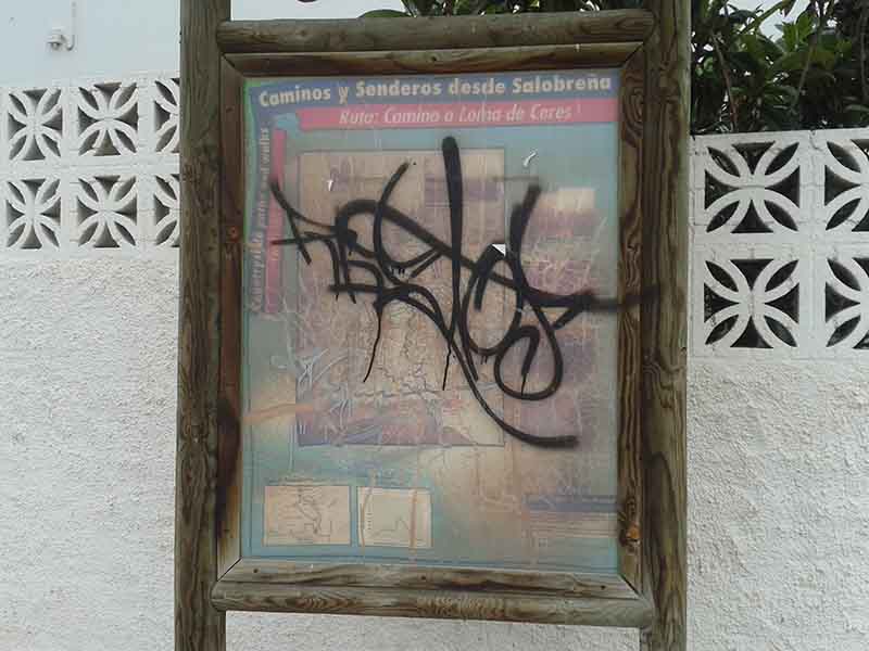 Cartel con graffiti