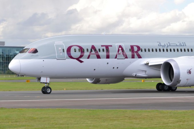 Boeing 787 Dreamliner in the colours of Qatar Airways beginning its take-off run at Farnborough International Airshow 2012