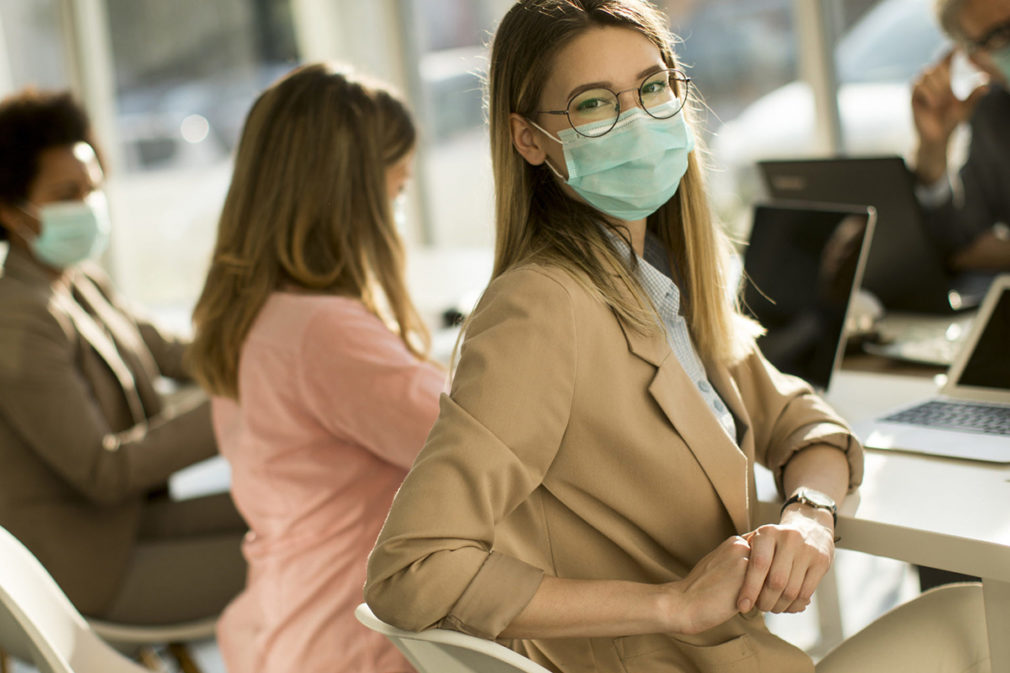 Young woman with group of business people have a meeting and wor