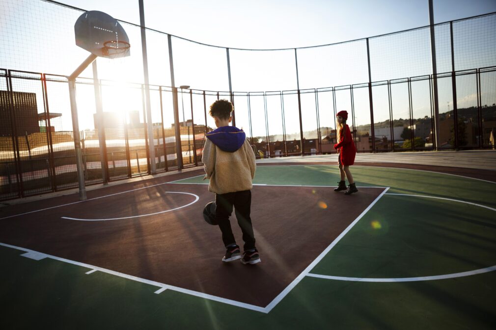 children-playing-basketball-on-field